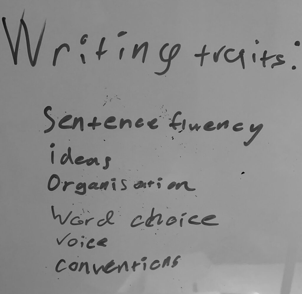 Hand written list of six writing traits 